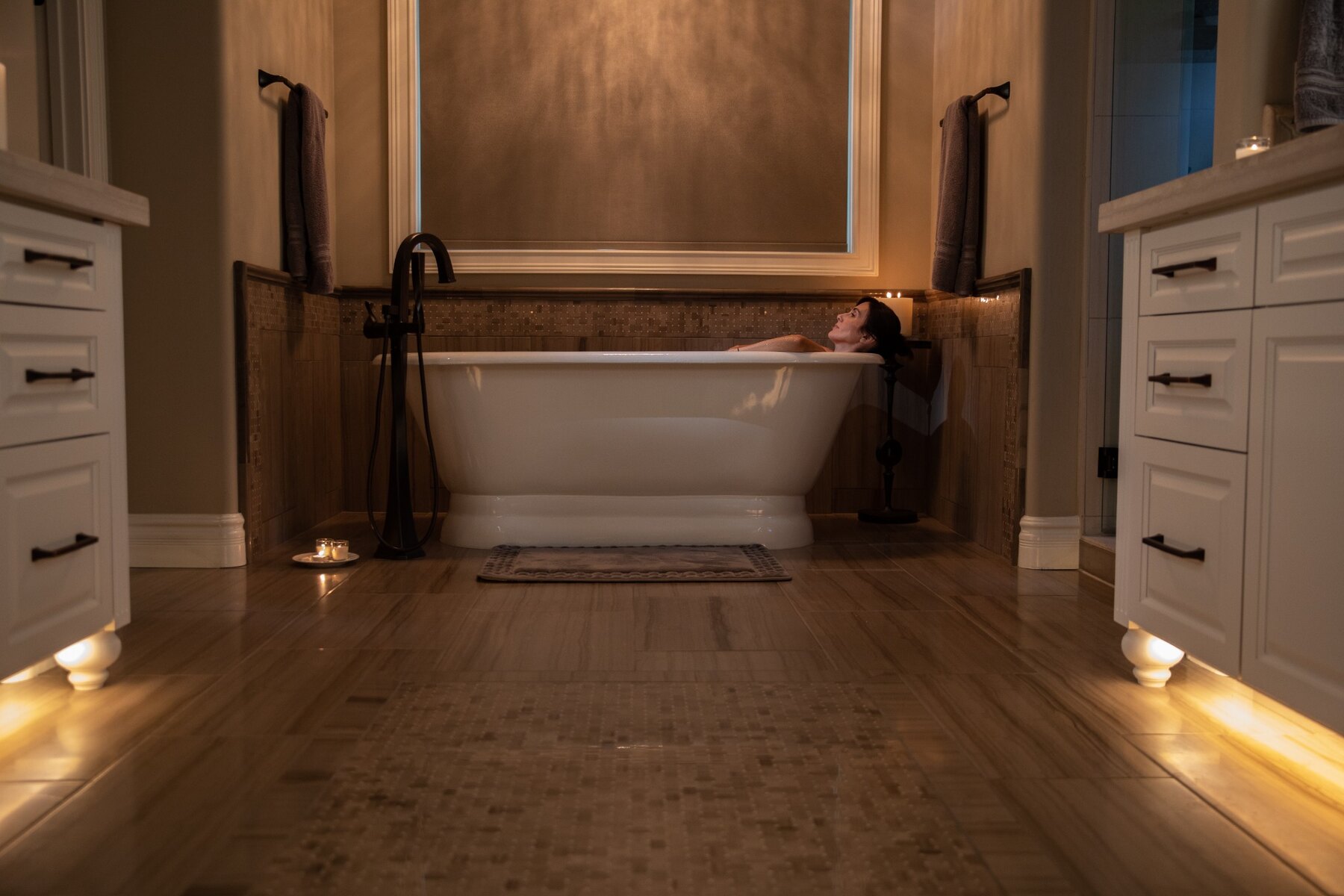 Luxury bathroom representing professionally installed electric radiant floor heating